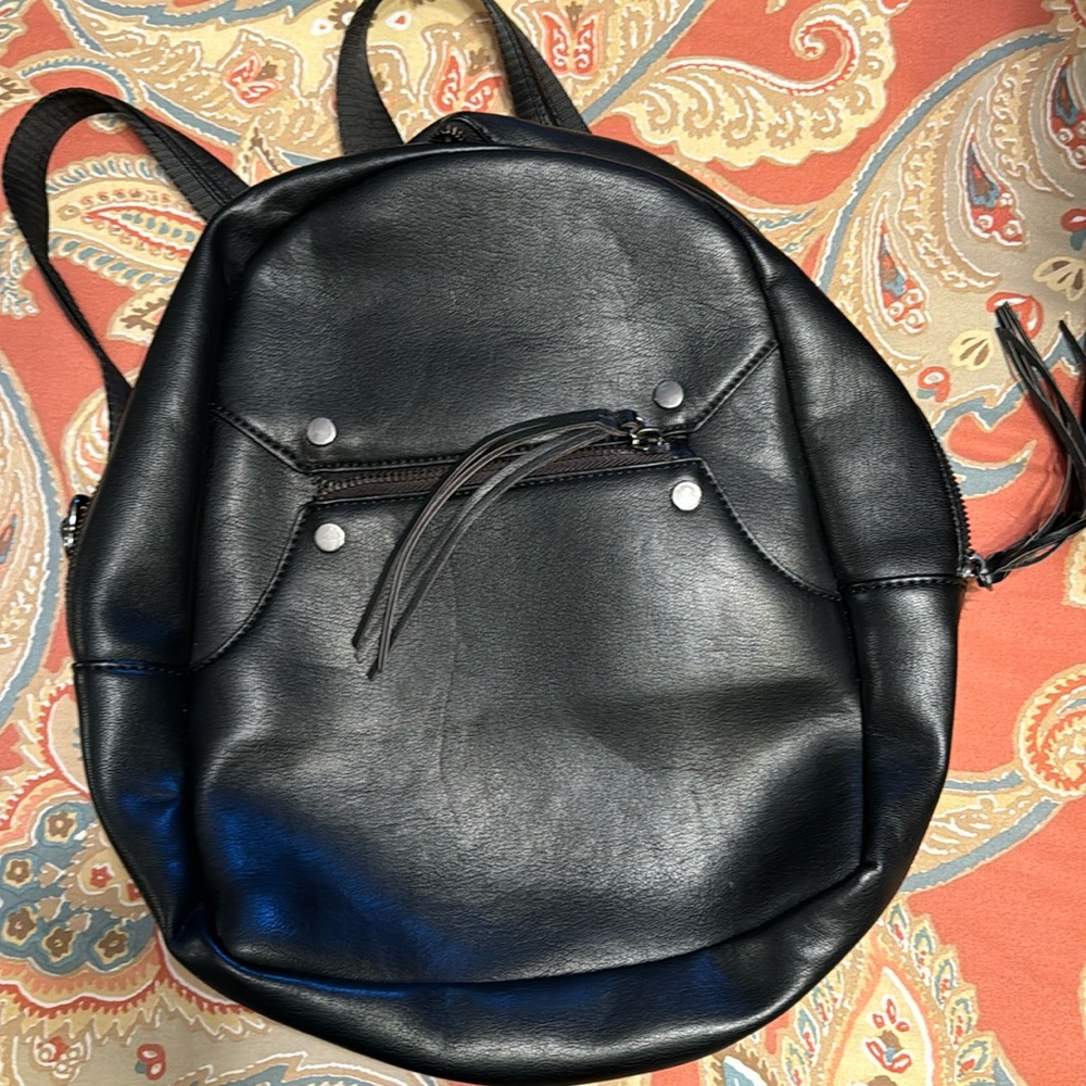 Bass black leather backpack.